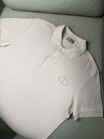 Polo Dior rosa con logo bordado rosa