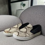 Prada mocasines slip-on en piel efecto pitón